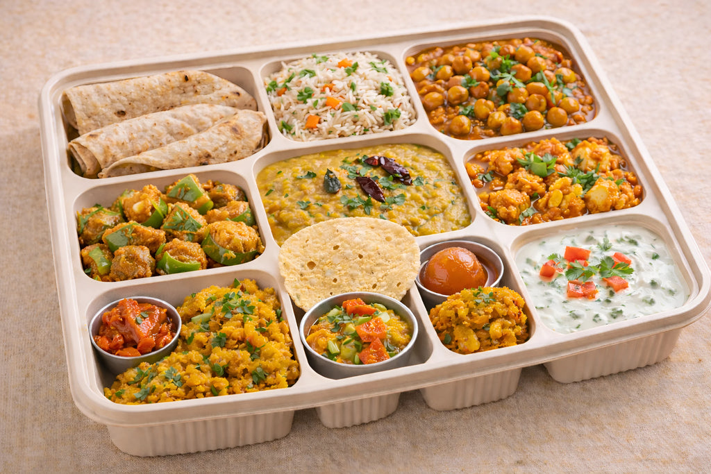 Healthy Meal with 3 Chapati with Fried Rice, Chapati 3, Veg Fried Rice, Gubi Fry, Chana Masala, Dal fry, Salad, Pickle, Papad, Sweet, capsicum bajji  & Raita